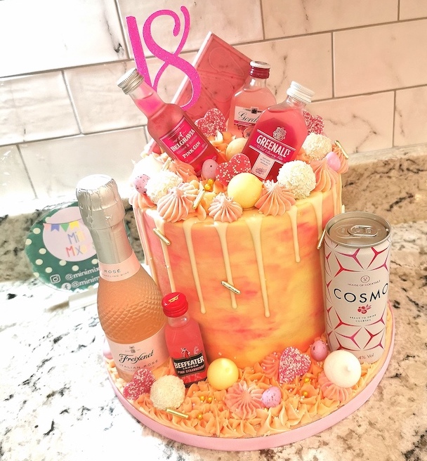 Pink and cream marble effect buttercream gin themed 18th birthday cake